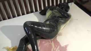 Scandal Girl In 2 Layers Of Latex Catsuits Black + Transparent With Gas Mask + Piss Erotic