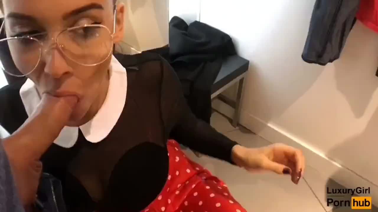 Black Woman Public Blowjob in a Clothing Store. A Young Baby with Glasses Swallows Cum Pussy Fuck