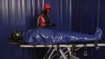 College Latex Girl Heavy Rubber Slave in Inflatable Bondage Bag and Breath Control Feet